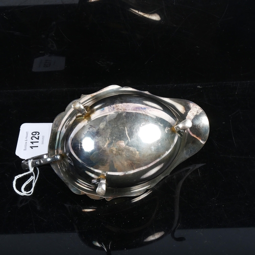 1129 - An Elizabeth II silver cream jug, Birmingham 1958, 4.4oz