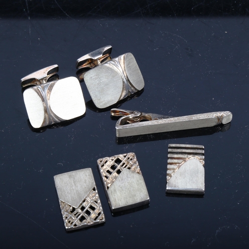 1137 - A pair of Finnish sterling silver cufflinks, and matching tie clip, 3 various pendants etc