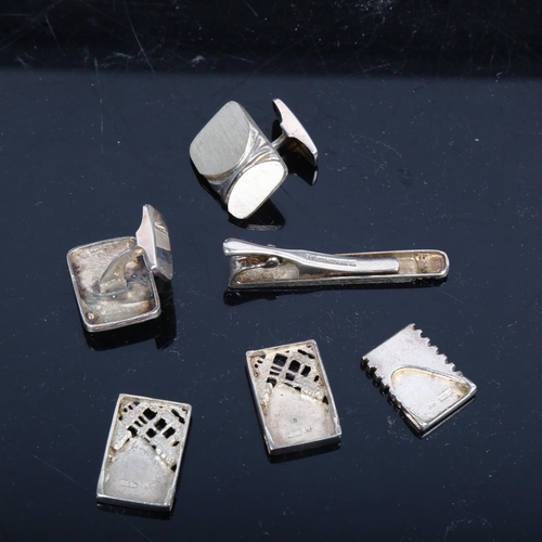 1137 - A pair of Finnish sterling silver cufflinks, and matching tie clip, 3 various pendants etc