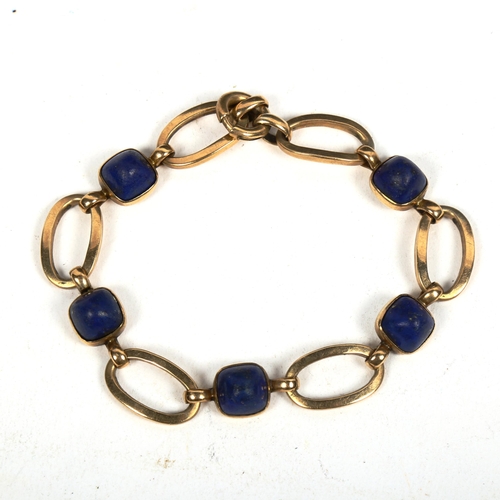 1165 - A 9ct gold open link bracelet, set with lapis lazuli panels