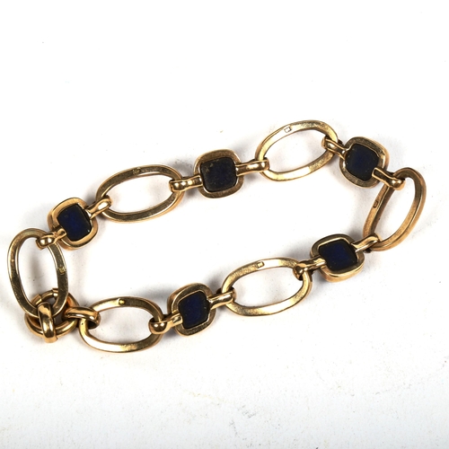 1165 - A 9ct gold open link bracelet, set with lapis lazuli panels