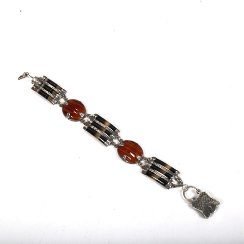 1167 - A fine quality unmarked Scottish silver and agate set panel bracelet, overall length 22cm