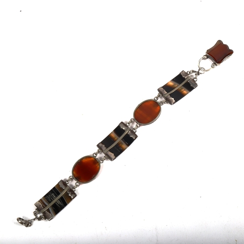 1167 - A fine quality unmarked Scottish silver and agate set panel bracelet, overall length 22cm