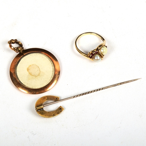 1168 - A gold pearl interwoven and red stone set ring, a 15ct horseshoe design stick pin, and a photo penda... 