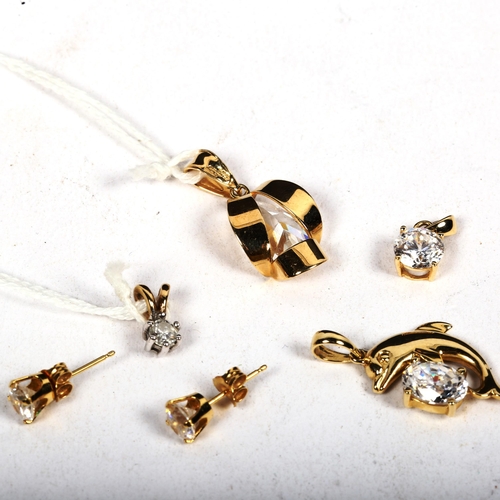 1171 - A group of gold pendants, to include a pair of 18ct gold and CZ set stud earrings, a 14ct gold dolph... 