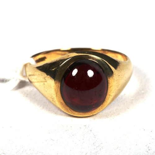 1174 - A 9ct gold and garnet set gent's signet ring, 5.7g, size V