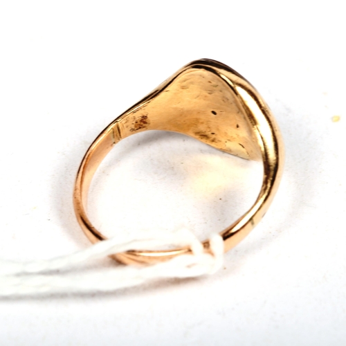 1176 - A gent's unmarked gold and stone set signet ring (repaired), 2.9g, size N