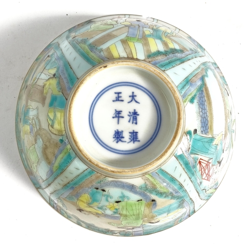 483 - A Chinese porcelain bowl with painted figure panels and 6 character mark, 16cm across