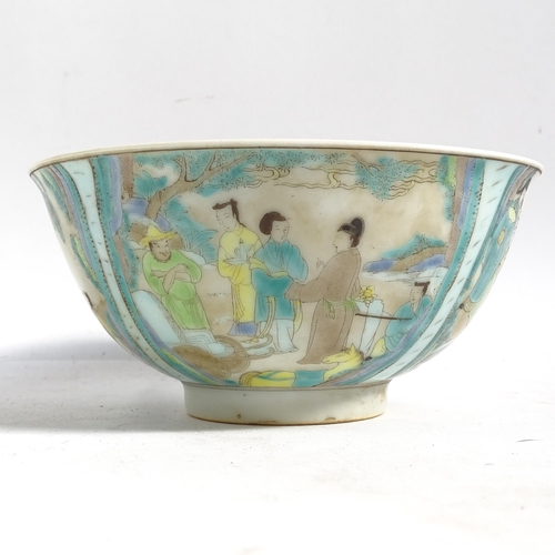 483 - A Chinese porcelain bowl with painted figure panels and 6 character mark, 16cm across