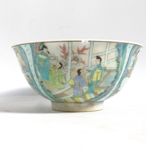 483 - A Chinese porcelain bowl with painted figure panels and 6 character mark, 16cm across