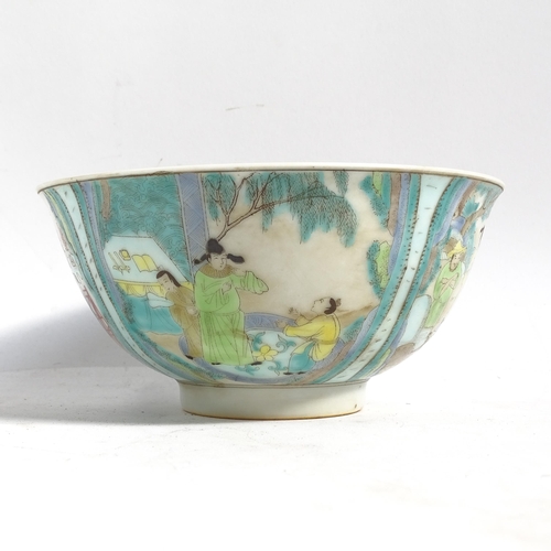 483 - A Chinese porcelain bowl with painted figure panels and 6 character mark, 16cm across