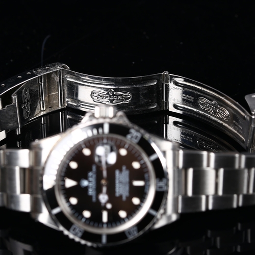 1 - ROLEX - a stainless steel Submariner Oyster Perpetual Date automatic bracelet watch, ref. 168000, ci... 