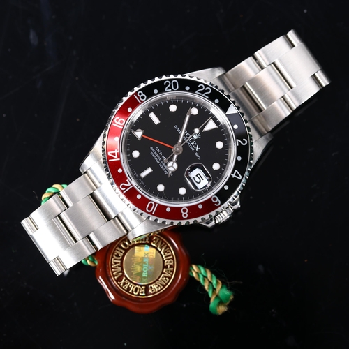2 - ROLEX - a stainless steel 'Coke' GMT Master II Oyster Perpetual Date automatic bracelet watch, ref. ... 