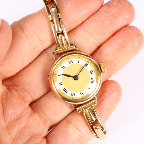 59 - A lady's early 20th century 9ct gold mechanical bracelet watch, champagne dial with silvered chapter... 