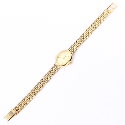 61 - ROTARY - a lady's 9ct gold quartz bracelet watch, oval champagne dial with baton hour markers and 9c... 