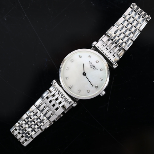 64 - LONGINES - a lady's stainless steel La Grande Classique quartz bracelet watch, ref. L4.209.4, mother... 