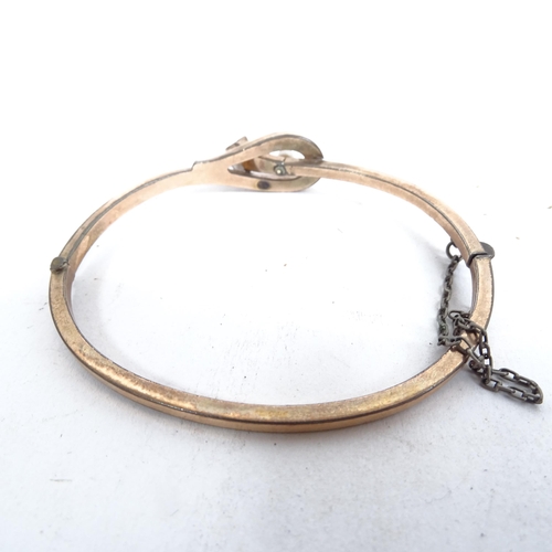 1103 - An embossed gold plated bangle and other gilded jewellery