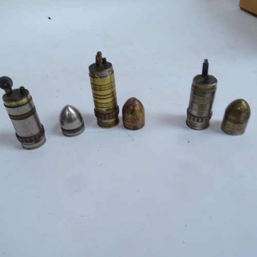 211 - Trench art, bullet shell cases, SOS 35 combination padlock and bullet case cigarette lighters / ciga... 