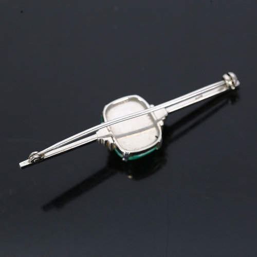 140 - An Art Deco 9ct white gold cabochon emerald bar brooch, emerald measures approx 13.78mm x 11.08mm x ... 