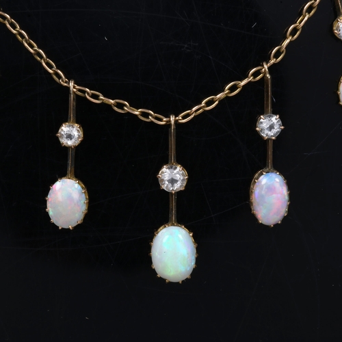 144 - An Edwardian 9ct gold opal and white sapphire fringe necklace, cable links with graduated pendants s... 