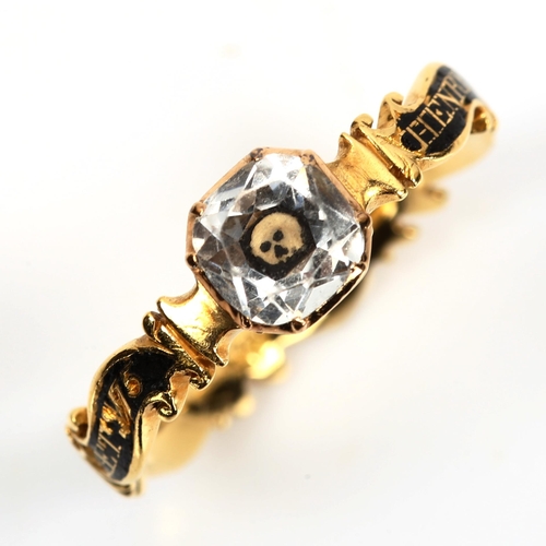 154 - A mid-18th century Memento Mori mourning ring, the central faceted rock crystal panel above an ename... 