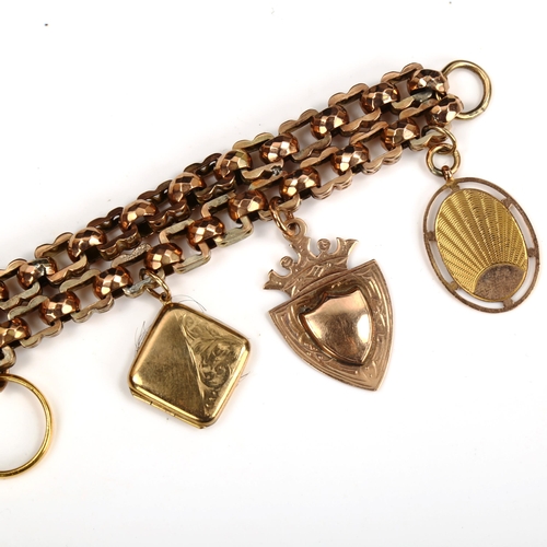 166 - An unmarked gold double fancy link chain charm bracelet, tests as 9ct, with various charms, includin... 