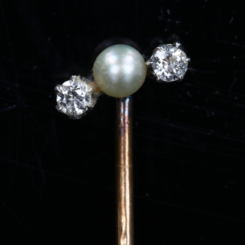 176 - An Antique three stone pearl and diamond stick pin, set with whole pearl and old European-cut diamon... 