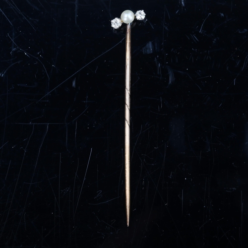 176 - An Antique three stone pearl and diamond stick pin, set with whole pearl and old European-cut diamon... 