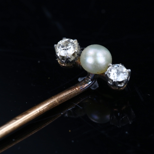 176 - An Antique three stone pearl and diamond stick pin, set with whole pearl and old European-cut diamon... 