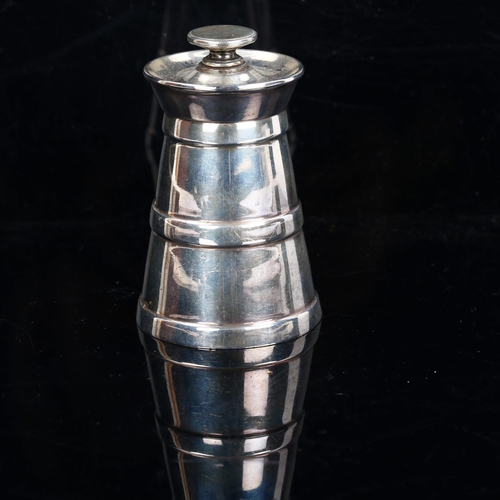 179 - A late Victorian silver lighthouse peppermill, by Hukin & Heath, hallmarks Birmingham 1897, height 8... 