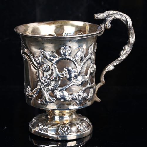 180 - A Victorian silver pedestal christening mug, relief embossed floral decoration with entwined serpent... 