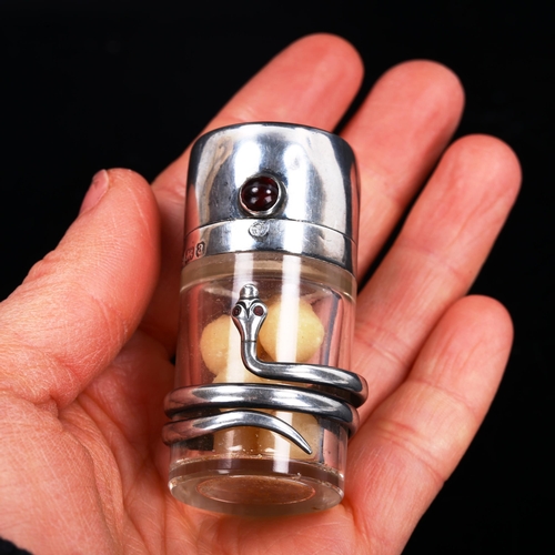 182 - A late Victorian novelty silver snake scent bottle, cylindrical form with cabochon garnet thumbpiece... 