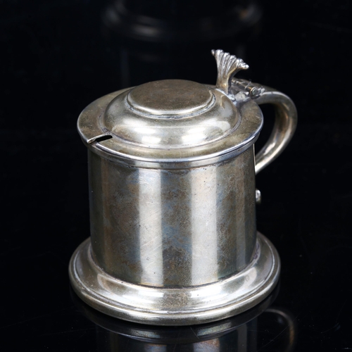 183 - A George V silver lidded tankard design mustard pot, with blue glass liner, by A Marston & Co, hallm... 