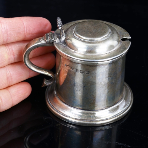 183 - A George V silver lidded tankard design mustard pot, with blue glass liner, by A Marston & Co, hallm... 