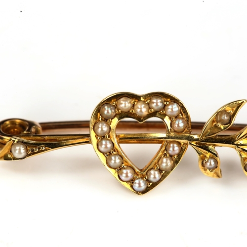 204 - A Victorian unmarked gold and split-pearl heart and arrow brooch, brooch length 35.7mm, 2.7g