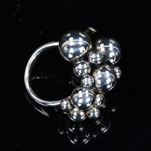 210 - GEORG JENSEN - a large Danish stylised sterling silver moonlight grapes ring, model no. 57, setting ... 