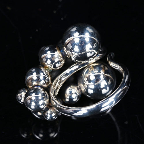 210 - GEORG JENSEN - a large Danish stylised sterling silver moonlight grapes ring, model no. 57, setting ... 