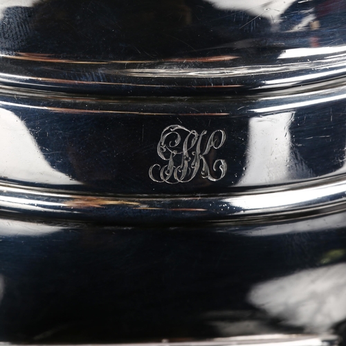 216 - A George III silver cream jug, with gilt interior on bun feet, indistinct maker's marks, hallmarks L... 