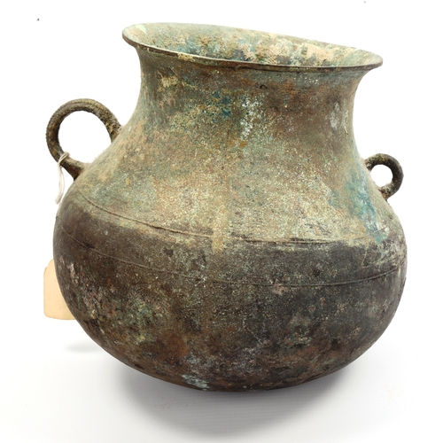 1003 - A Chinese Han Dynasty verdigris bronze cauldron with ring handles, height 17cm, rim diameter 12.5cm