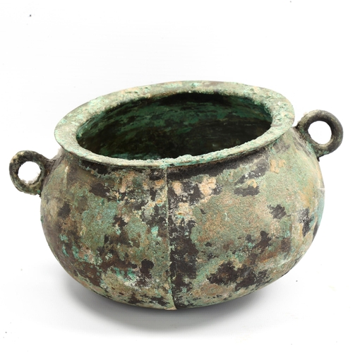 1005 - A Chinese Han Dynasty verdigris bronze cauldron with ring handles, diameter 19cm, rim diameter 16cm