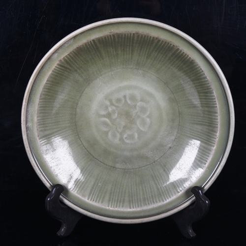 1008 - A Chinese celadon glaze bowl with relief moulded decoration, diameter 30cm