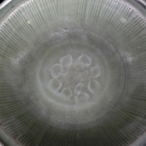 1008 - A Chinese celadon glaze bowl with relief moulded decoration, diameter 30cm