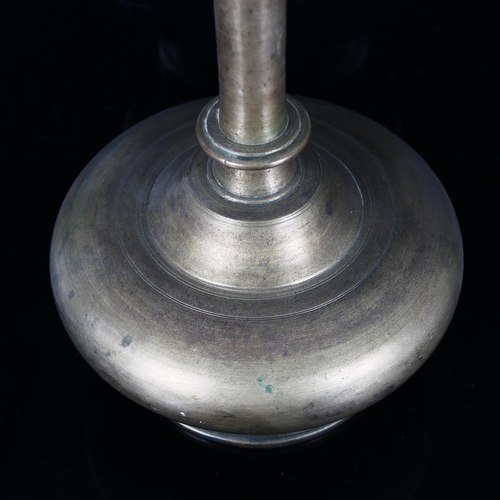 1010 - 19th century Islamic bronze narrow-neck vessel of plain form, height 29cm