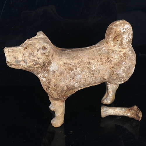 1017 - A Chinese Tang Dynasty pottery standing dog, length 30cm