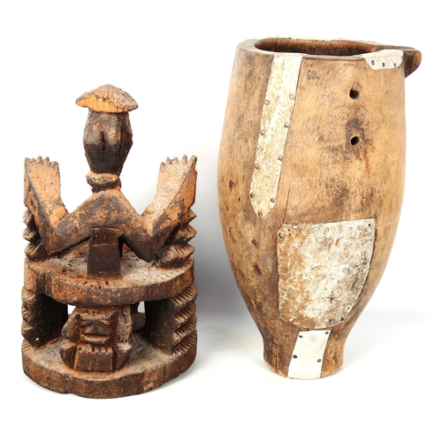 1025 - African Tribal carved and painted wood figure, height 26cm, and a wooden water pot with aluminium mo... 