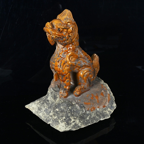 1035 - A Chinese Tang Dynasty yellow glaze pottery lion roof tile, height 33cm