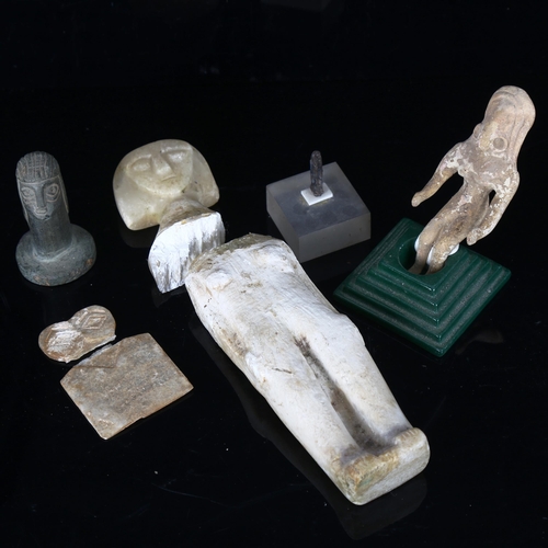 1039 - A group of Antiquities, including a miniature Egyptian lapis amulet, height 23mm, a Greek terracotta... 