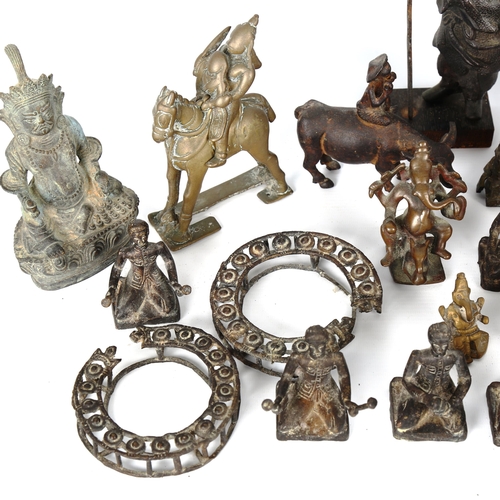 1040 - A collection of Indian bronzes, including a band of musicians, Buddhas, and standing figures