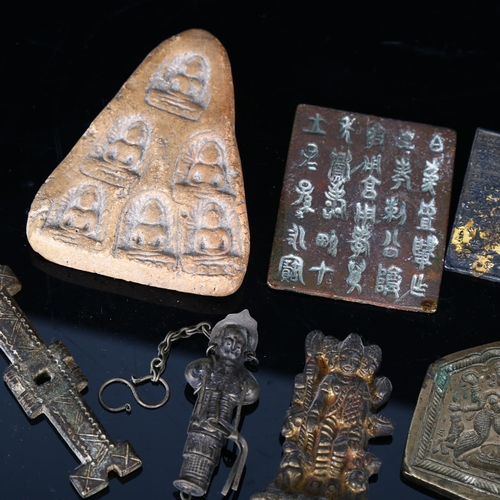 1042 - A group of Oriental artefacts, including bronze plaques, a gilt-bronze Buddha plaque etc (7)