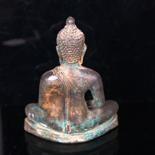 1044 - A Chinese verdigris bronze seated Buddha, height 15cm